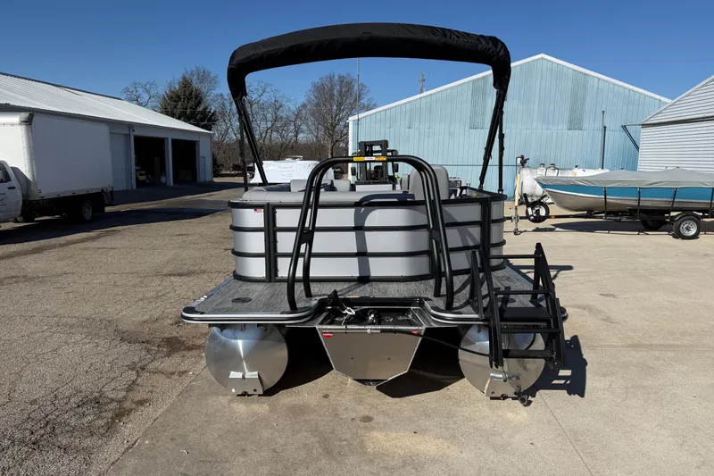 Slide: The Image of 2026 Bentley Pontoons Legacy 200 Cruise XL at a marina, showcasing sleek design. - 6