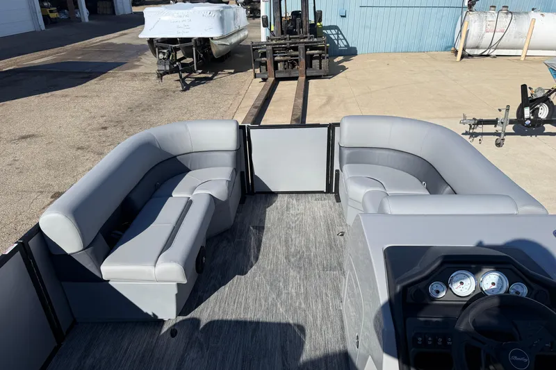 Slide: The Image of 2026 Bentley Pontoons Legacy 200 Cruise XL interior with gray seating and dashboard. - 9