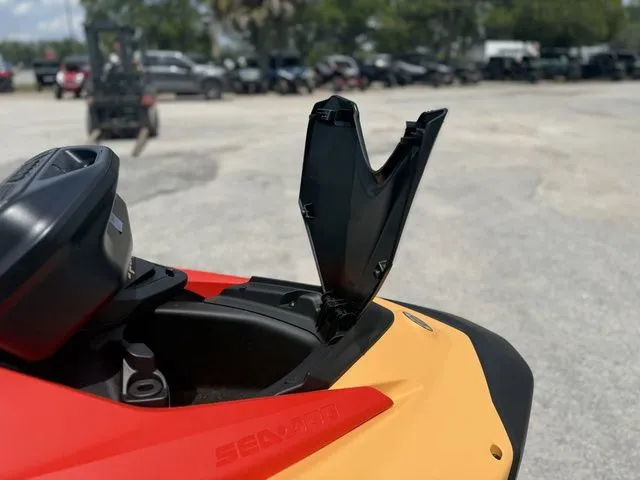 Slide: The Image of Close-up of a 2026 Sea-Doo Spark for 2 with open storage compartment. - 13