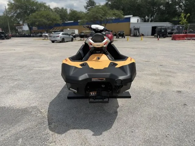 Slide: The Image of 2026 Sea-Doo Spark for 2, yellow, in parking lot. - 7