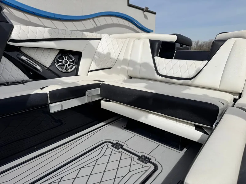 Slide: The Image of Interior of a 2018 Tigé 23RZX boat with luxurious seating. - 14