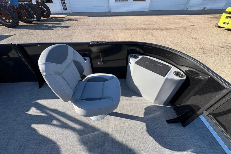 Slide: The Image of 2026 Bentley Pontoons Fish 220 FWD CW interior with swivel chair and storage compartment. - 12