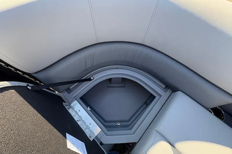 Slide: The Image of 2026 Bentley Pontoons Fish 220 FWD CW interior seating and storage compartment. - 30