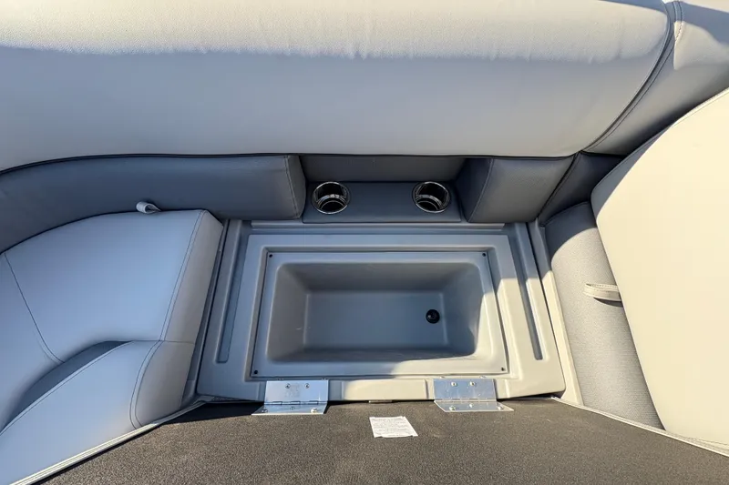 Slide: The Image of 2026 Bentley Pontoons Fish 220 FWD CW interior seating with built-in storage compartment. - 31