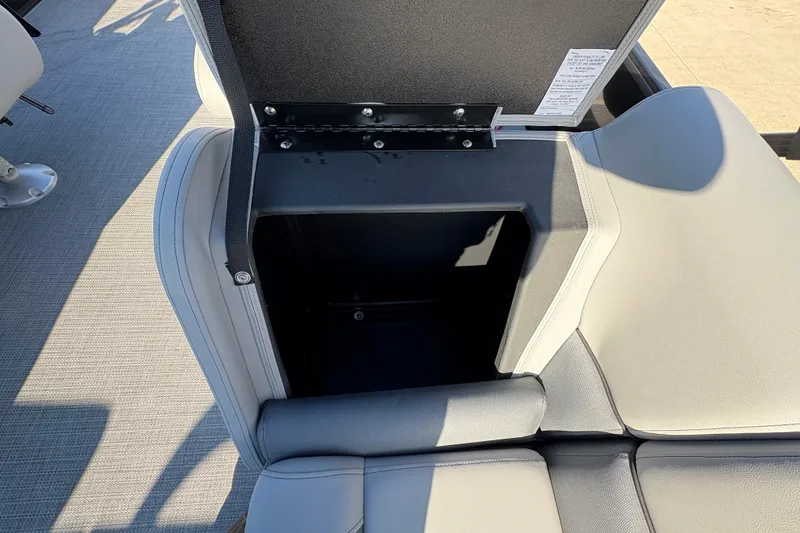 Slide: The Image of Open storage compartment in 2026 Bentley Pontoons Fish 220 FWD CW boat seat. - 33