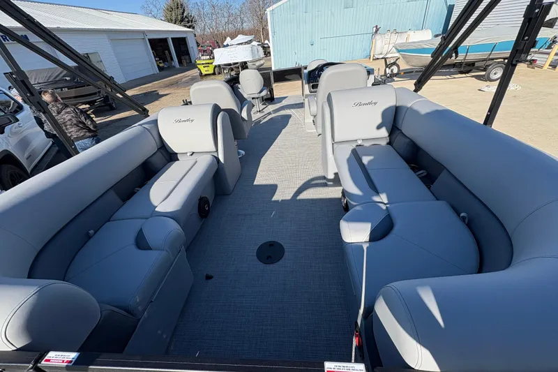 Slide: The Image of 2026 Bentley Pontoons Fish 220 FWD CW with spacious seating and modern design. - 34
