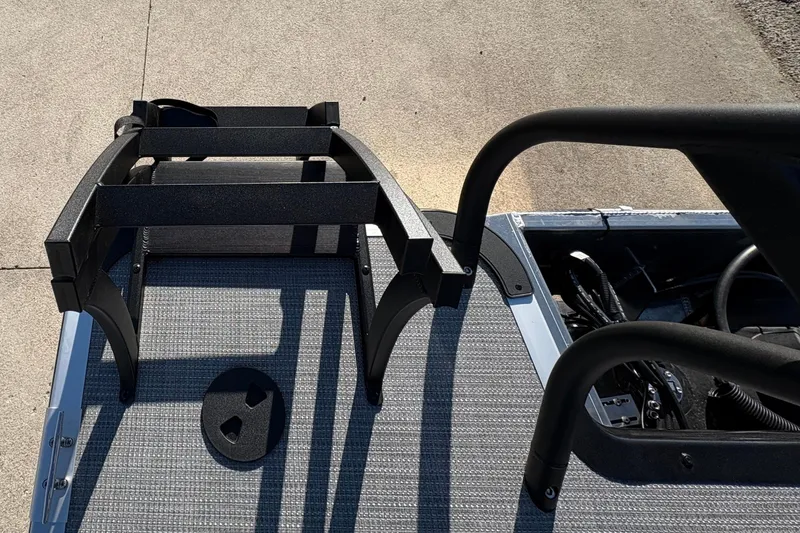 Slide: The Image of 2026 Bentley Pontoons Fish 220 FWD CW deck with black railing and textured flooring. - 37