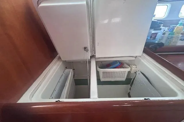 Slide: The Image of Interior view of 2001 Beneteau Oceanis 461 yacht's storage compartments. - 14