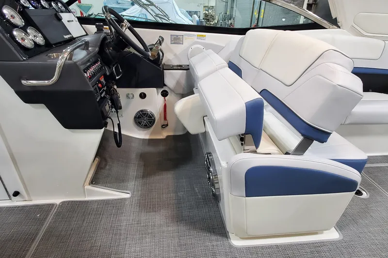 Slide: The Image of 2020 Formula 310 Bowrider cockpit with modern controls and comfortable seating. - 19