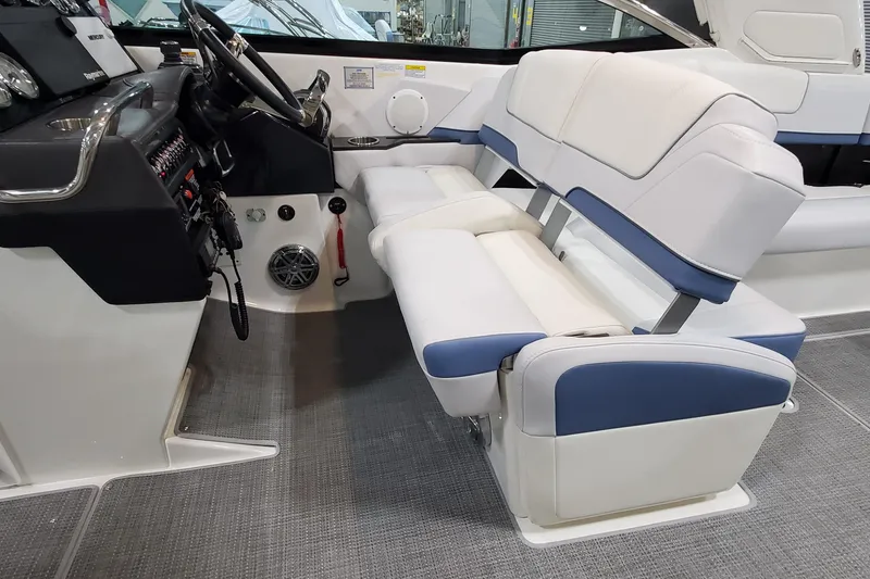 Slide: The Image of 2020 Formula 310 Bowrider interior with dual helm seats and modern dashboard. - 20