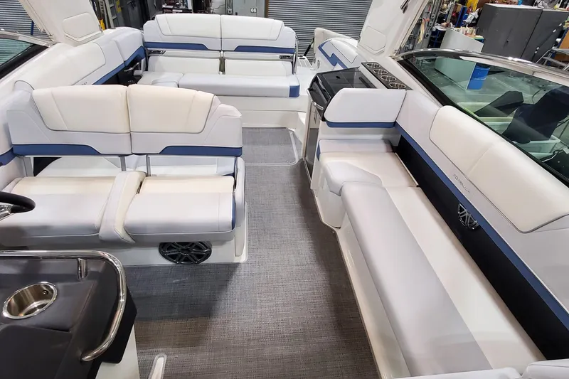 Slide: The Image of 2020 Formula 310 Bowrider interior with luxurious white seating and modern design. - 24