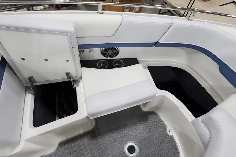 Slide: The Image of 2020 Formula 310 Bowrider interior with white seating and cup holders. - 30