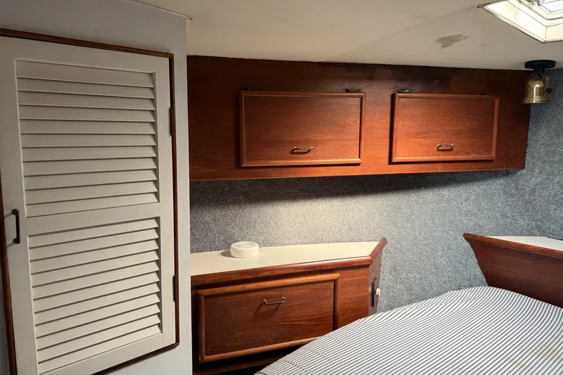 Slide: The Image of Ocean 44 V-berth closet and storage - 15