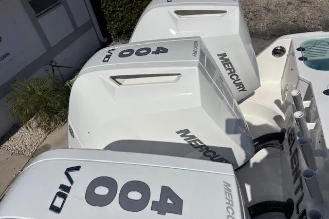 Slide: The Image of Three Mercury outboard engines on a 2008 Everglades 350LX boat. - 10