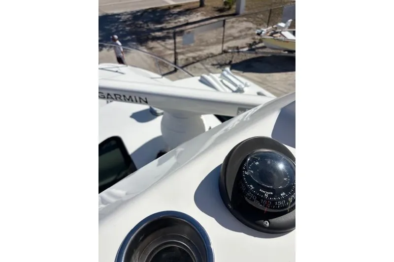 Slide: The Image of Compass and Garmin equipment on 2008 Everglades 350LX boat deck. - 27