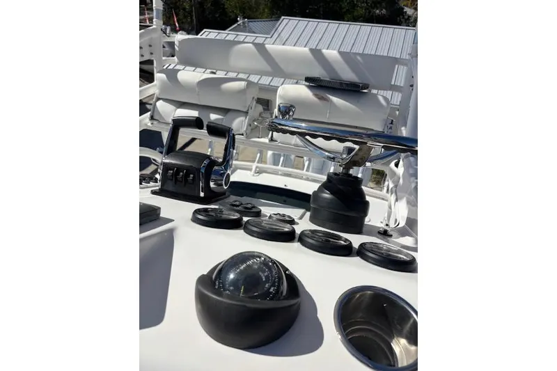 Slide: The Image of Control panel of 2008 Everglades 350LX boat with navigational instruments. - 28