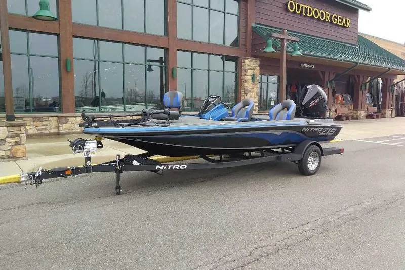 The Image of 2026 Nitro Z19 XL boat parked outside outdoor gear store. - 0