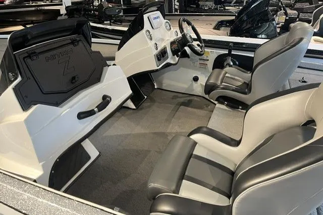 Slide: The Image of Interior of a 2025 Nitro Z18 boat featuring sleek seating and modern dashboard controls. - 6