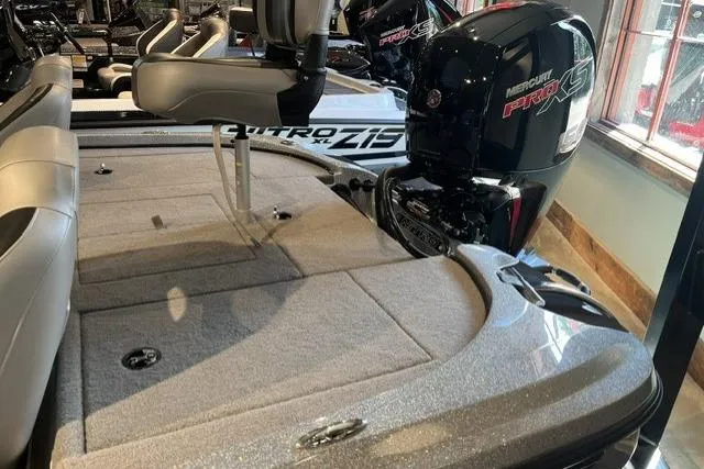 Slide: The Image of 2025 Nitro Z18 boat interior with Mercury Pro XS engine, showcasing seating and deck area. - 8