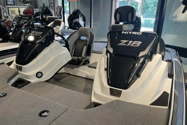 Slide: The Image of 2025 Nitro Z18 boats displayed indoors, showcasing sleek design and modern features. - 7