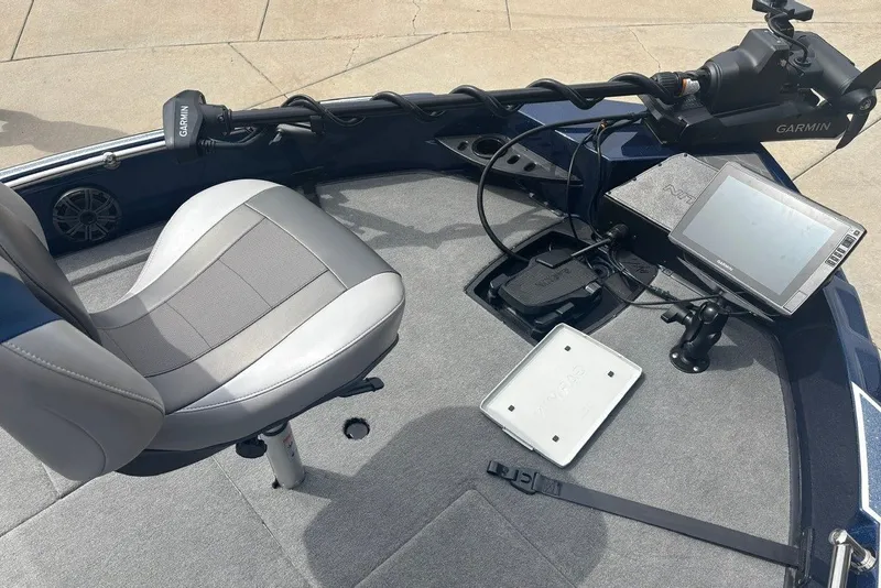 Slide: The Image of 2026 Nitro ZV21 Pro boat interior with Garmin electronics and comfortable seating. - 18