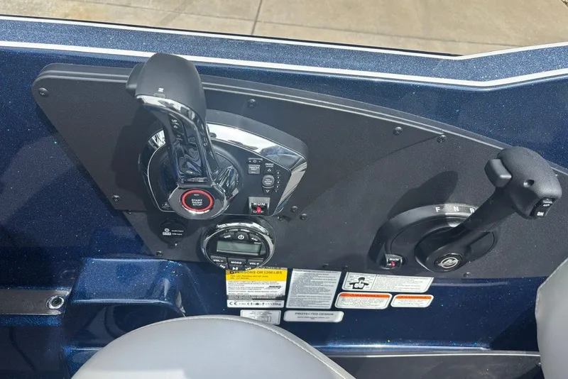 Slide: The Image of Control panel of a 2026 Nitro ZV21 Pro boat with throttle and start button. - 14