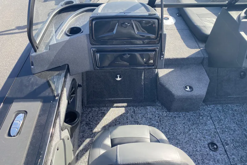 Slide: The Image of 2026 Tracker Targa V-19 Combo boat interior with seating and storage compartments. - 67