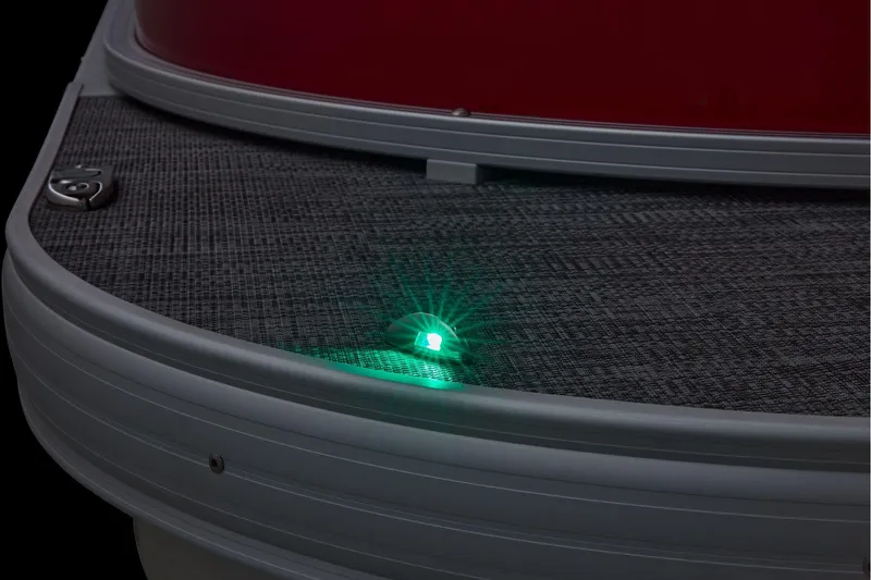 Slide: The Image of Manufacturer Provided Image: 2026 Sun Tracker Party Barge 22 DLX with illuminated green navigation light. - 88