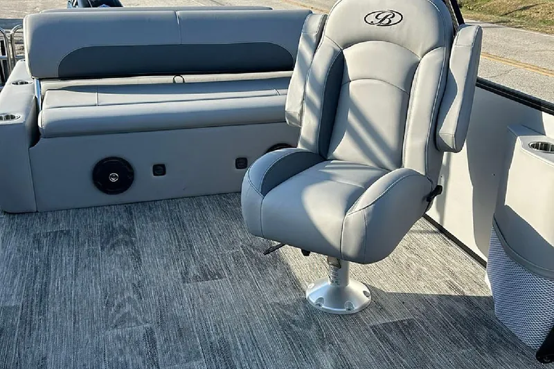Slide: The Image of 2026 Bentley Pontoons Legacy 243 Swingback interior with plush seating and modern design. - 21