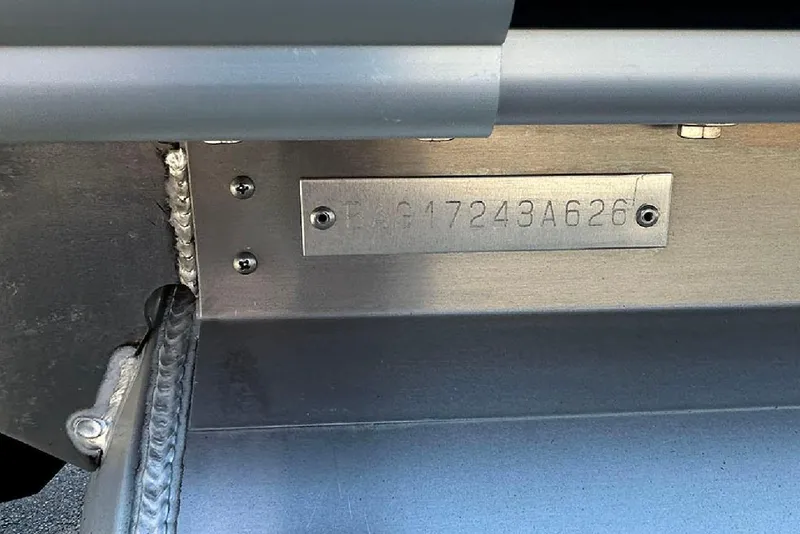 Slide: The Image of 2026 Bentley Pontoons Legacy 243 Swingback hull identification number plate. - 25