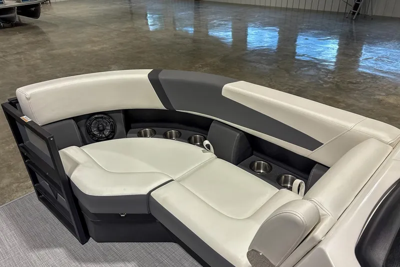 Slide: The Image of 2025 Trifecta 22RF CS boat interior with plush seating and cup holders. - 12