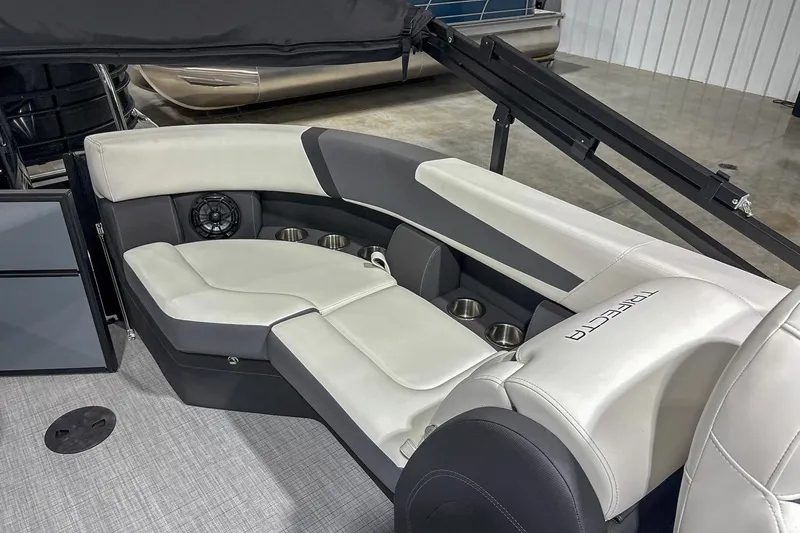 Slide: The Image of Luxurious seating on 2025 Trifecta 22RF CS pontoon boat with cup holders and speaker. - 4