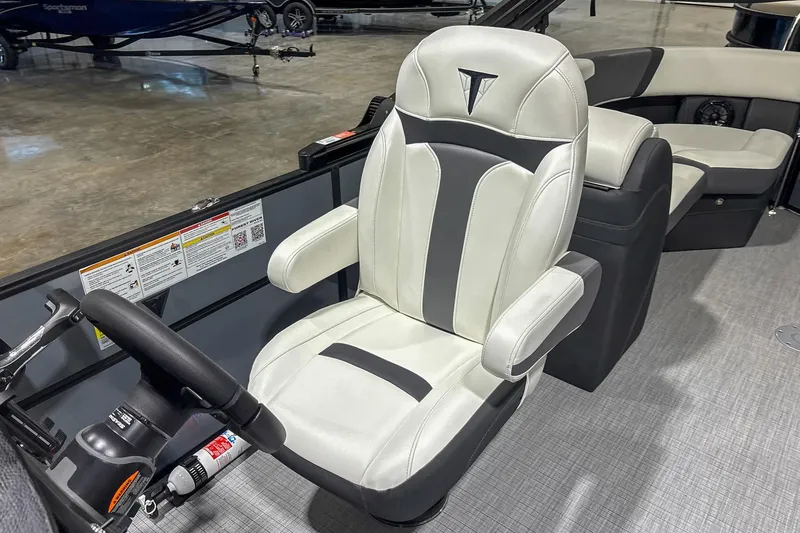 Slide: The Image of Captain's chair in 2025 Trifecta 22RF CS boat, featuring sleek design and comfortable seating. - 8