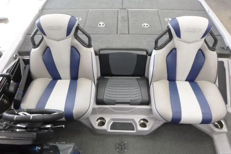 Slide: The Image of 2020 Skeeter FXR21 boat interior with dual blue and white seats. - 13