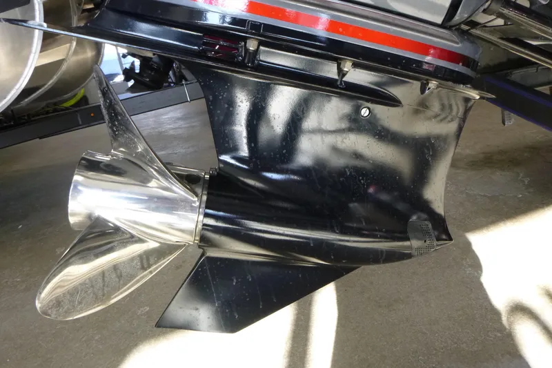 Slide: The Image of 2020 Skeeter FXR21 boat propeller and lower unit, showcasing sleek design and metallic finish. - 20