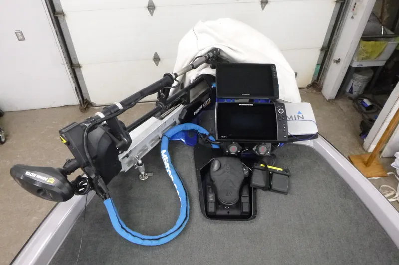 Slide: The Image of 2020 Skeeter FXR21 boat with advanced Garmin and Humminbird electronics setup. - 6