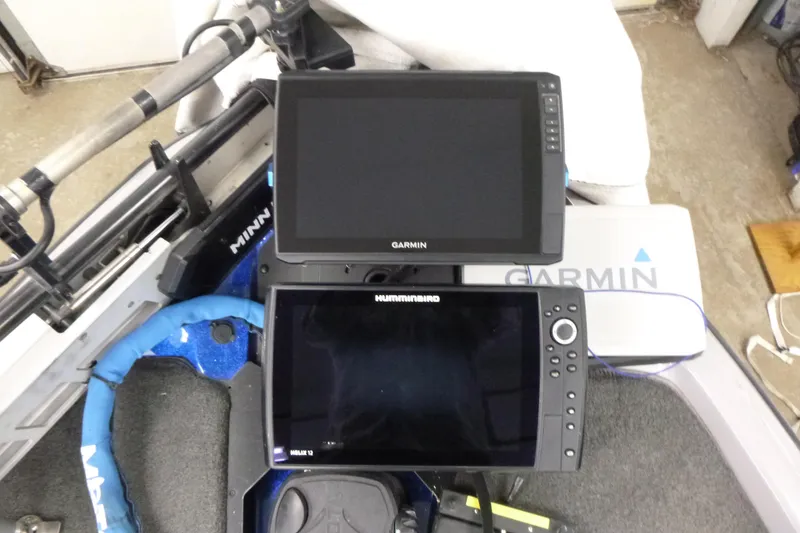Slide: The Image of 2020 Skeeter FXR21 boat with Garmin and Humminbird fish finders installed. - 7