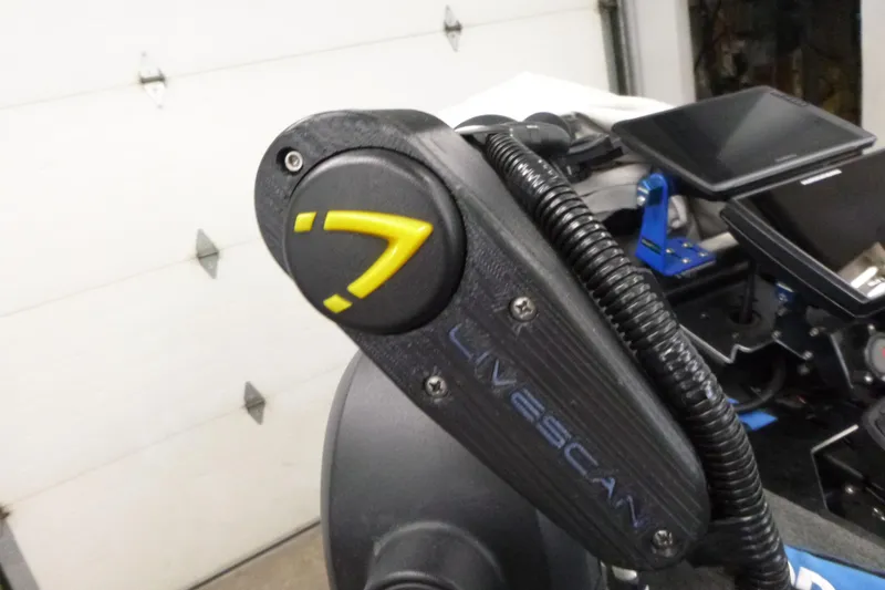 Slide: The Image of 2020 Skeeter FXR21 boat with Livescan technology, featuring advanced navigation controls. - 8