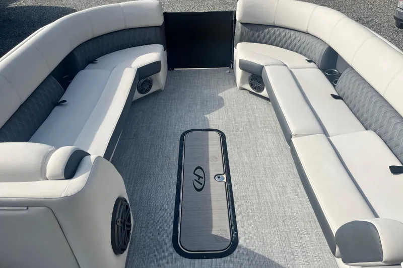 Slide: The Image of Luxurious seating area of 2023 Harris Cruiser Sunliner 250 pontoon boat. - 5