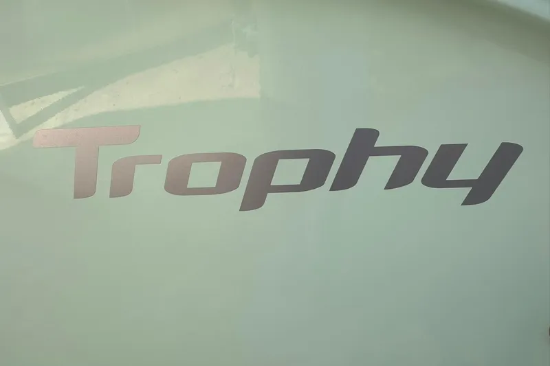 Slide: The Image of 2026 Bayliner Trophy T20CC logo on boat hull, sleek design. - 10