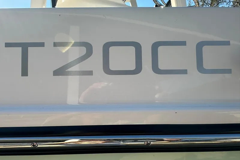 Slide: The Image of 2026 Bayliner Trophy T20CC boat model nameplate close-up. - 11