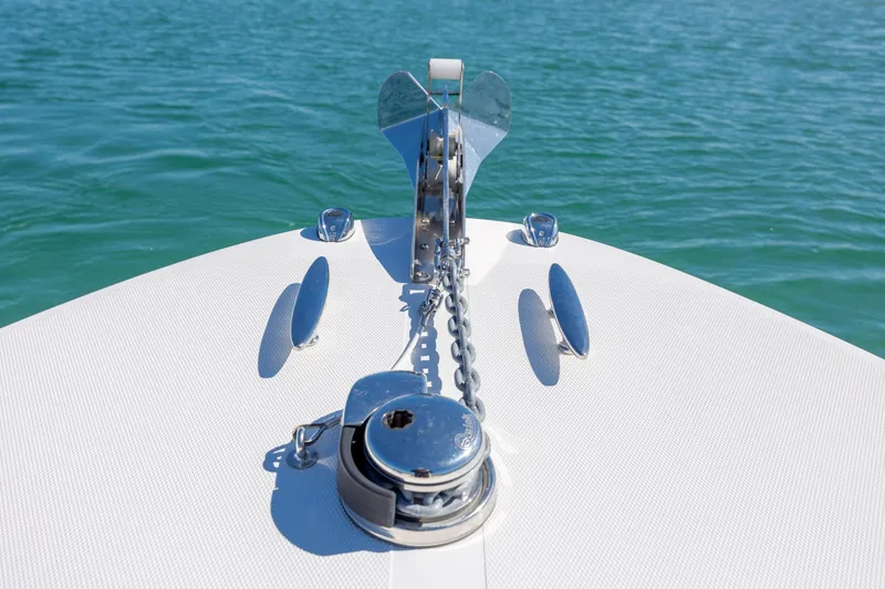 Slide: The Image of Bow of 2022 Vanquish Bristol Harbor 23 CC boat with anchor and chain. - 28