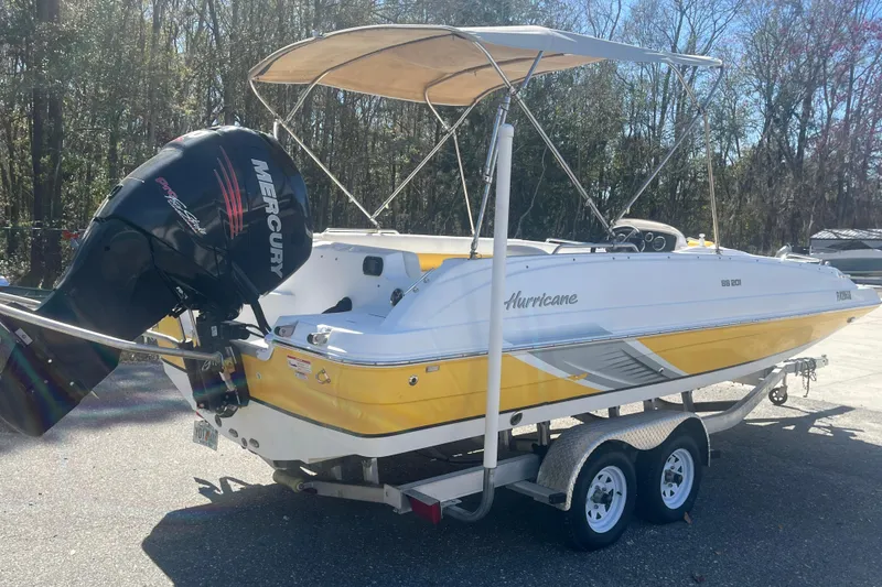 Slide: The Image of 2017 Godfey Hurricane SS 210 boat with Mercury engine on trailer. - 2