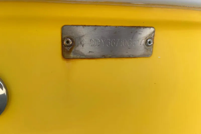Slide: The Image of Yellow Godfey Hurricane SS 210 boat with metal identification plate, 2017 model. - 23