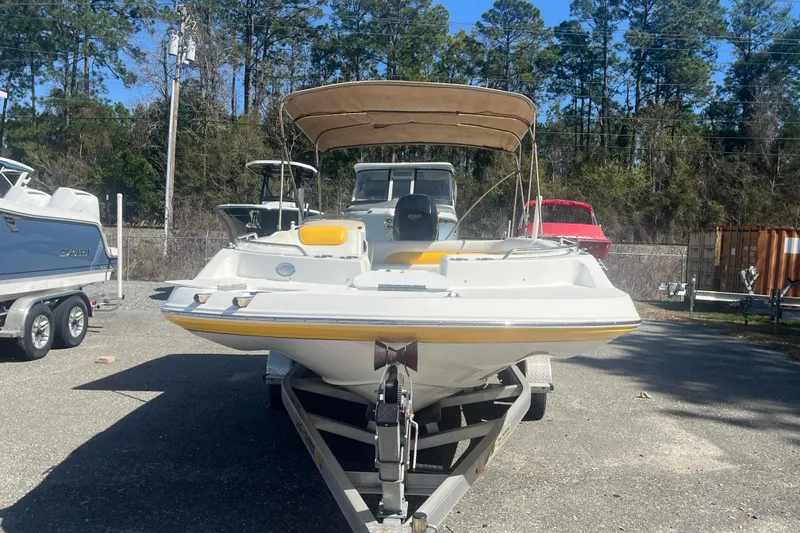 Slide: The Image of 2017 Godfey Hurricane SS 210 boat on trailer, parked outdoors. - 4