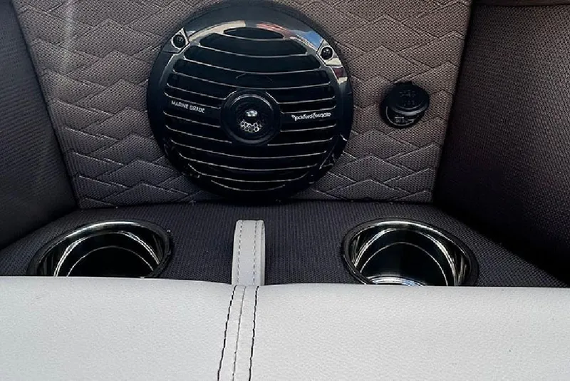 Slide: The Image of 2026 Bentley Pontoons 223 Elite Swingback DC interior with marine-grade speaker and cup holders. - 11