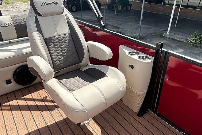 Slide: The Image of Luxurious seating on 2026 Bentley Pontoons 223 Elite Swingback DC with cup holders. - 14