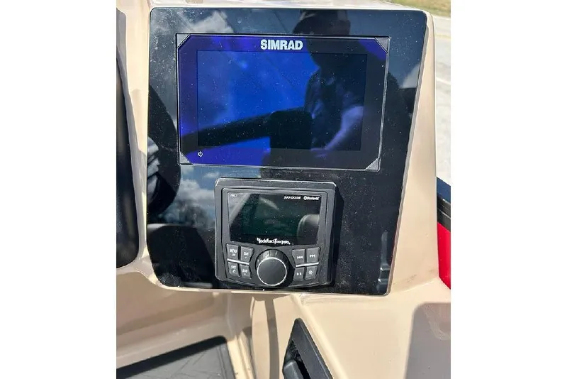 Slide: The Image of Simrad display and Rockford Fosgate audio system on 2026 Bentley Pontoons 223 Elite Swingback DC. - 16