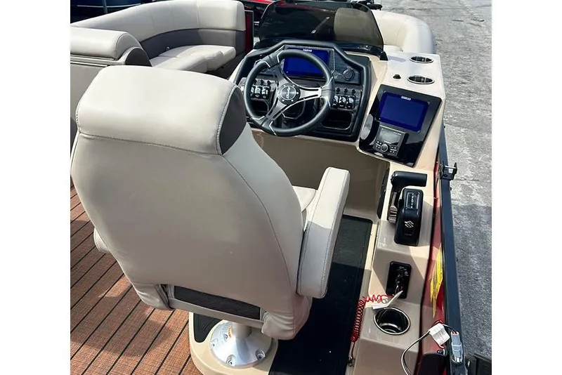 Slide: The Image of 2026 Bentley Pontoons 223 Elite Swingback DC interior with steering console and seating. - 18