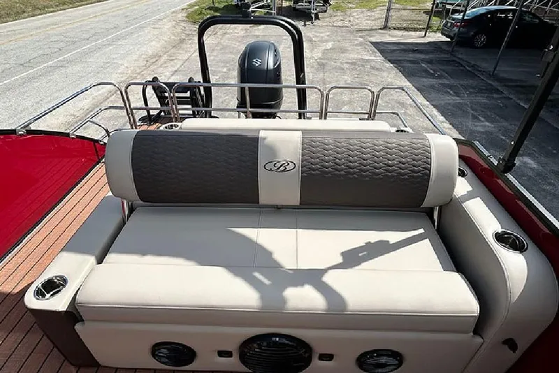 Slide: The Image of 2026 Bentley Pontoons 223 Elite Swingback DC with luxurious seating and modern design. - 19